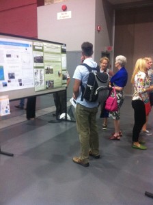 Taylor Ward presenting his poster on his undergraduate thesis